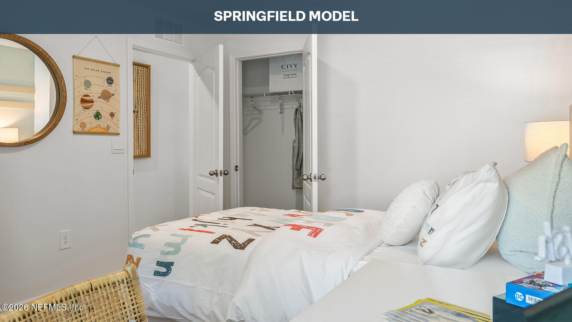 201 Ayamonte Road St. Augustine, FL 32084 - Photo 23 of 42 a bedroom with a bed and a painting on the wall