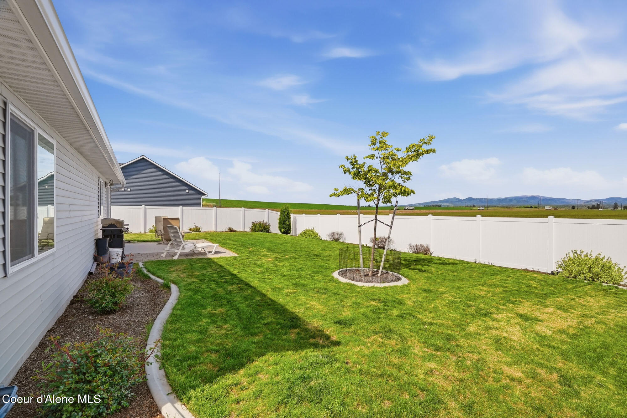 12704 North Cavanaugh Drive Rathdrum, ID 83858 - Photo 2 of 23 Rear Yard