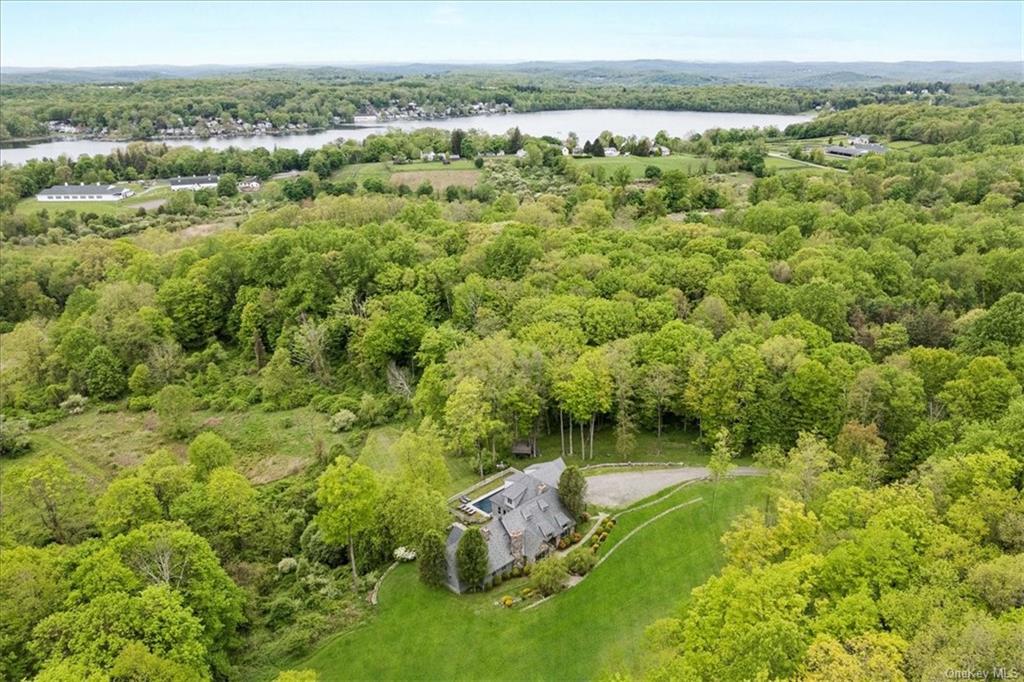 Sophisticated Country Home on over 5 and a half acres set amongst 59 acres of Land Trust.