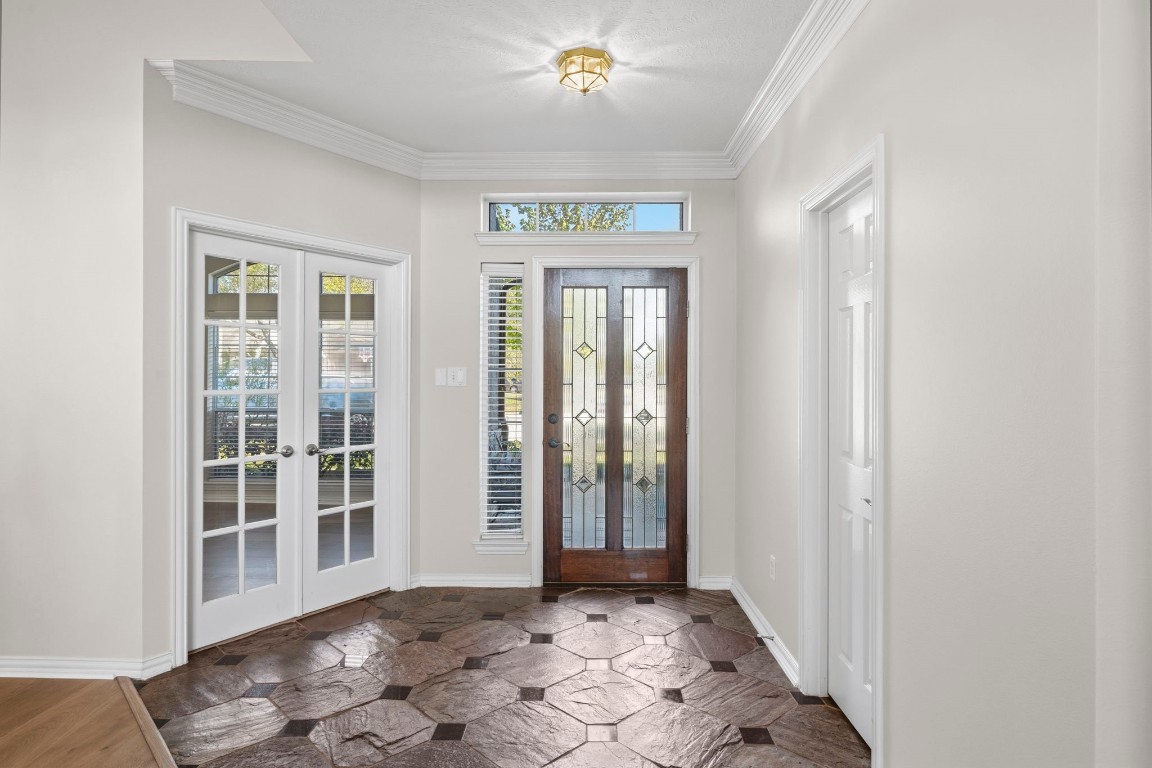 10103 Lazy Lagoon Houston, TX 77065 - Photo 11 of 50 wooden floor in an empty room with a window