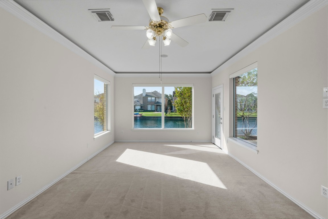 10103 Lazy Lagoon Houston, TX 77065 - Photo 21 of 50 a view of an empty room with a window