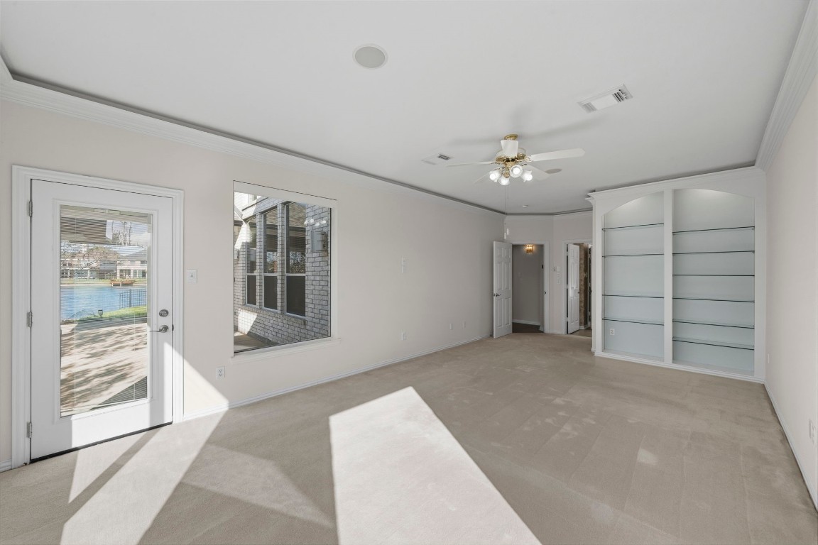 10103 Lazy Lagoon Houston, TX 77065 - Photo 22 of 50 a view of livingroom with an empty space & kitchen view