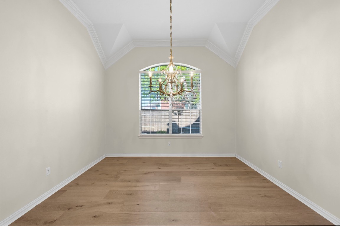 10103 Lazy Lagoon Houston, TX 77065 - Photo 23 of 50 a view of an empty room with a window