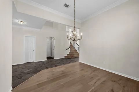 a view of a chandelier in a room