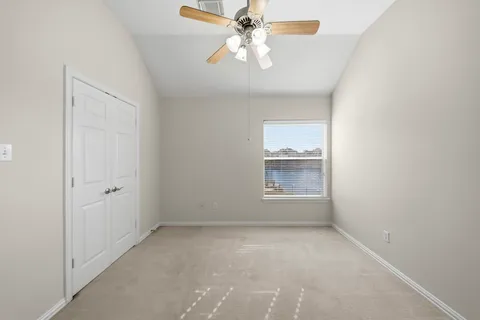 a view of a balcony with furniture