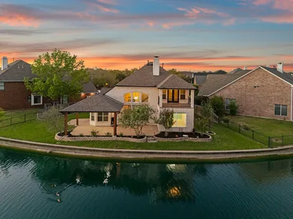 an aerial view of a house with a garden