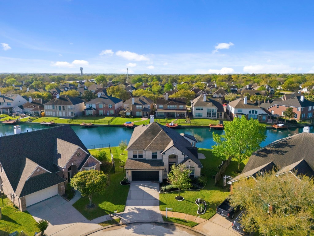10103 Lazy Lagoon Houston, TX 77065 - Photo 47 of 50 an aerial view of a house with a garden