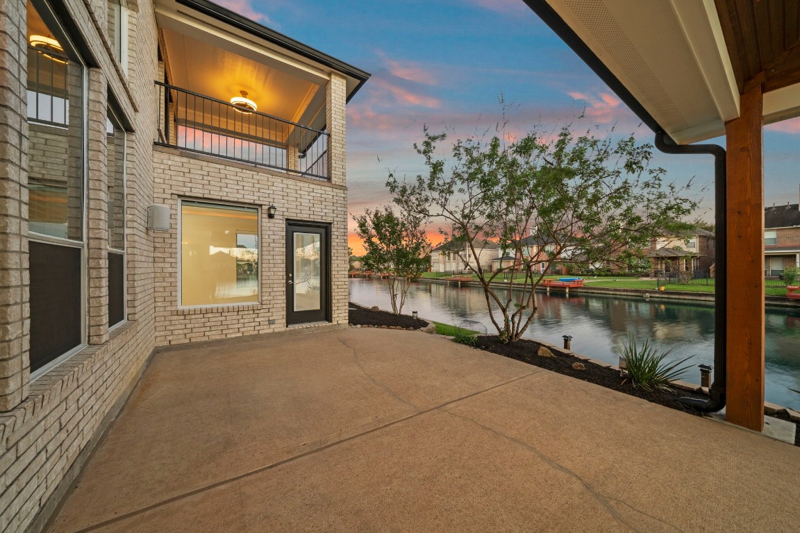 10103 Lazy Lagoon Houston, TX 77065 - Photo 7 of 50 a view of a house with a yard from a balcony