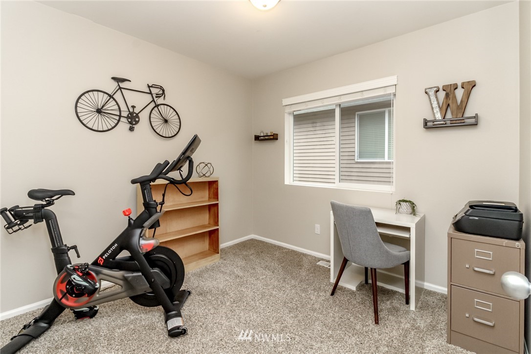 27357 Maple Ridge Way Southeast Maple Valley, WA 98038 - Photo 22 of 39 a view of a room with gym equipment