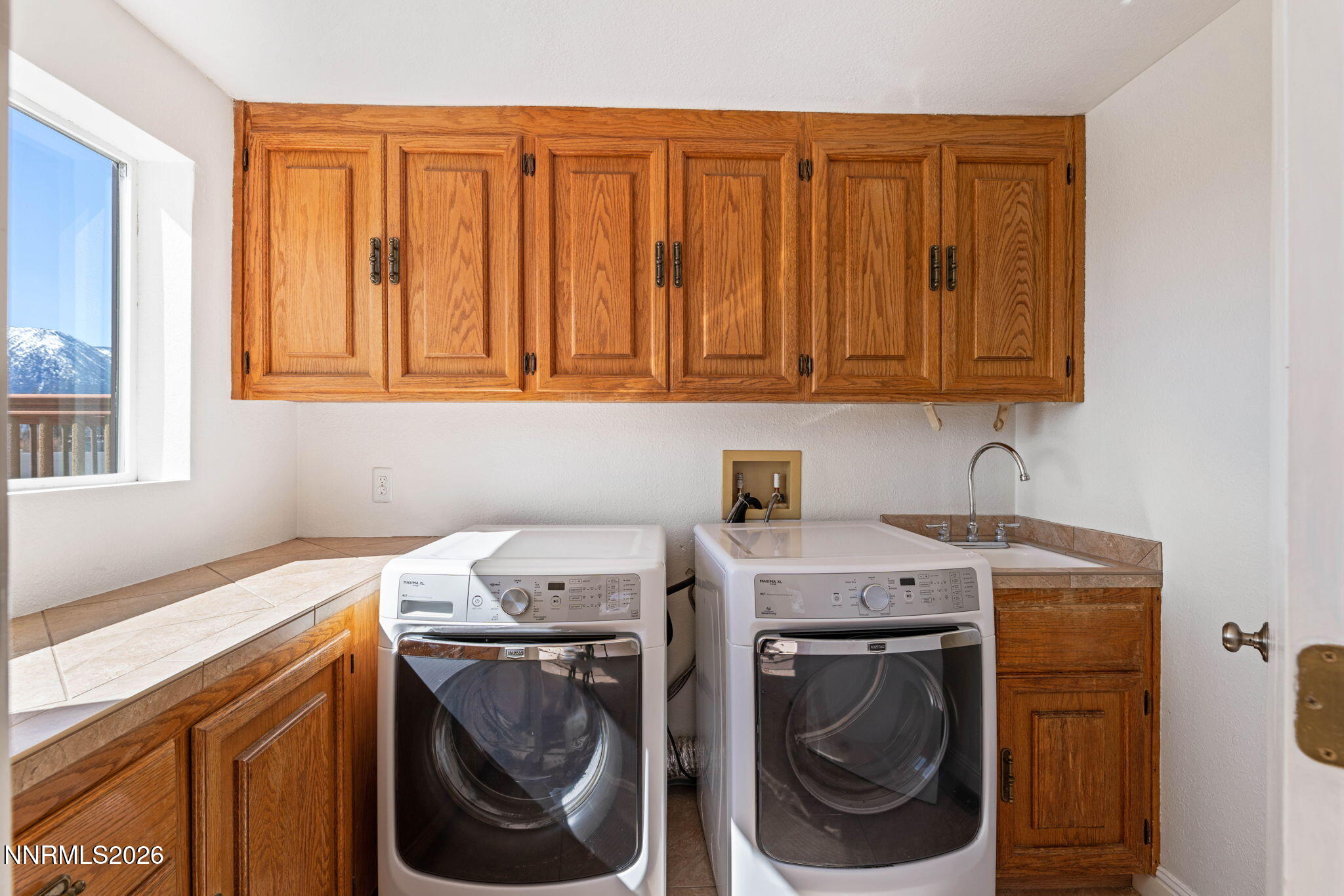 1663 Mackland Avenue Minden, NV 89423 - Photo 14 of 27 a utility room with dryer and washer