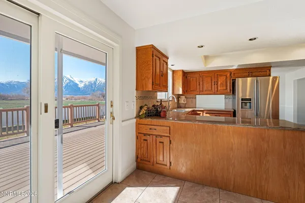 a bathroom with a sink vanity mirror and toilet