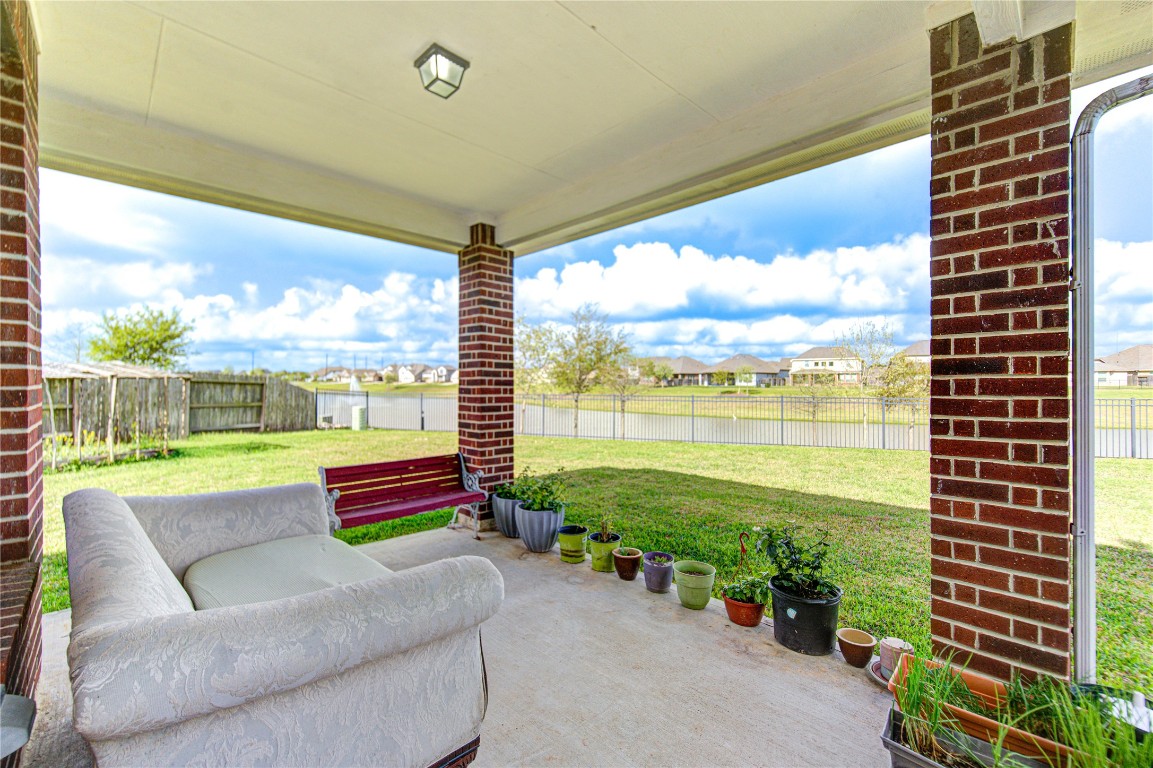 4602 Kingston Shores Lane Rosharon, TX 77583 - Photo 34 of 38 Covered patio overlooking Pond