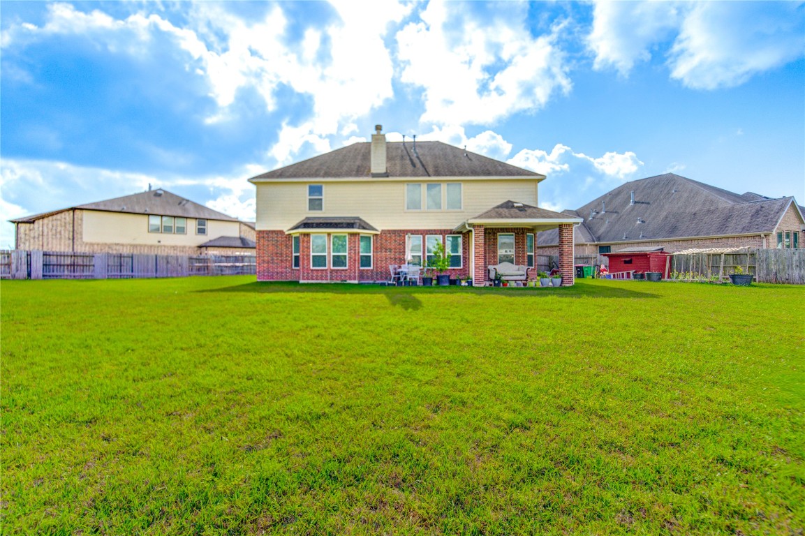 4602 Kingston Shores Lane Rosharon, TX 77583 - Photo 36 of 38 Spacious backyard with plenty of greenspace
