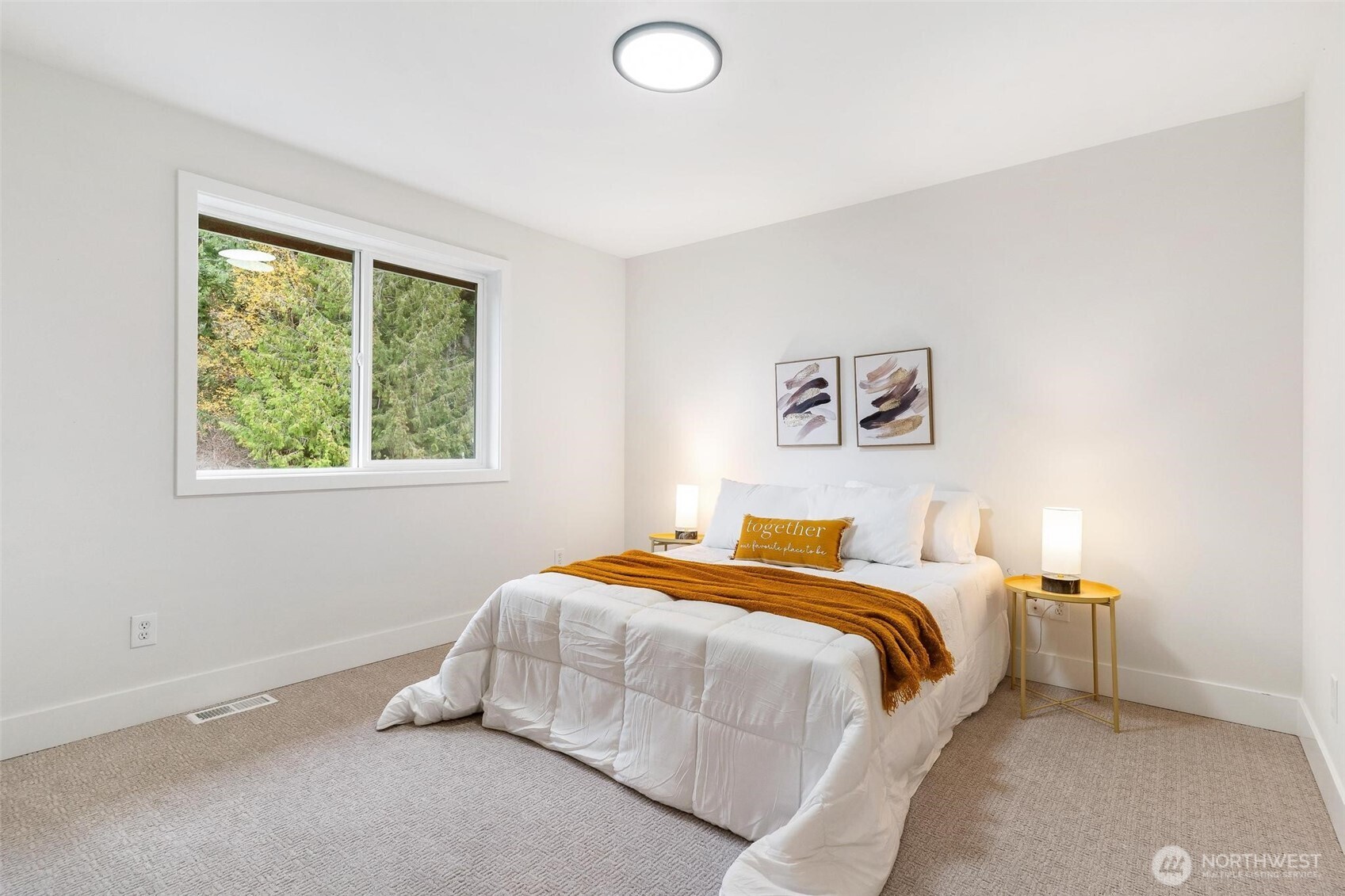 223 South Camano Ridge Road Camano Island, WA 98282 - Photo 14 of 40 a bedroom with a bed and a window