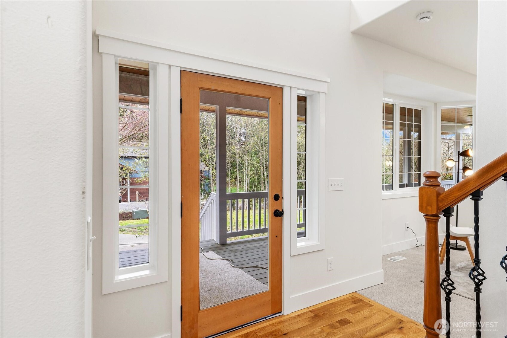 223 South Camano Ridge Road Camano Island, WA 98282 - Photo 18 of 40 a view of a hallway with wooden floor and entryway