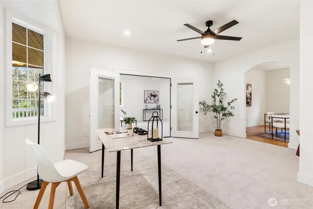 a living room with furniture and a window