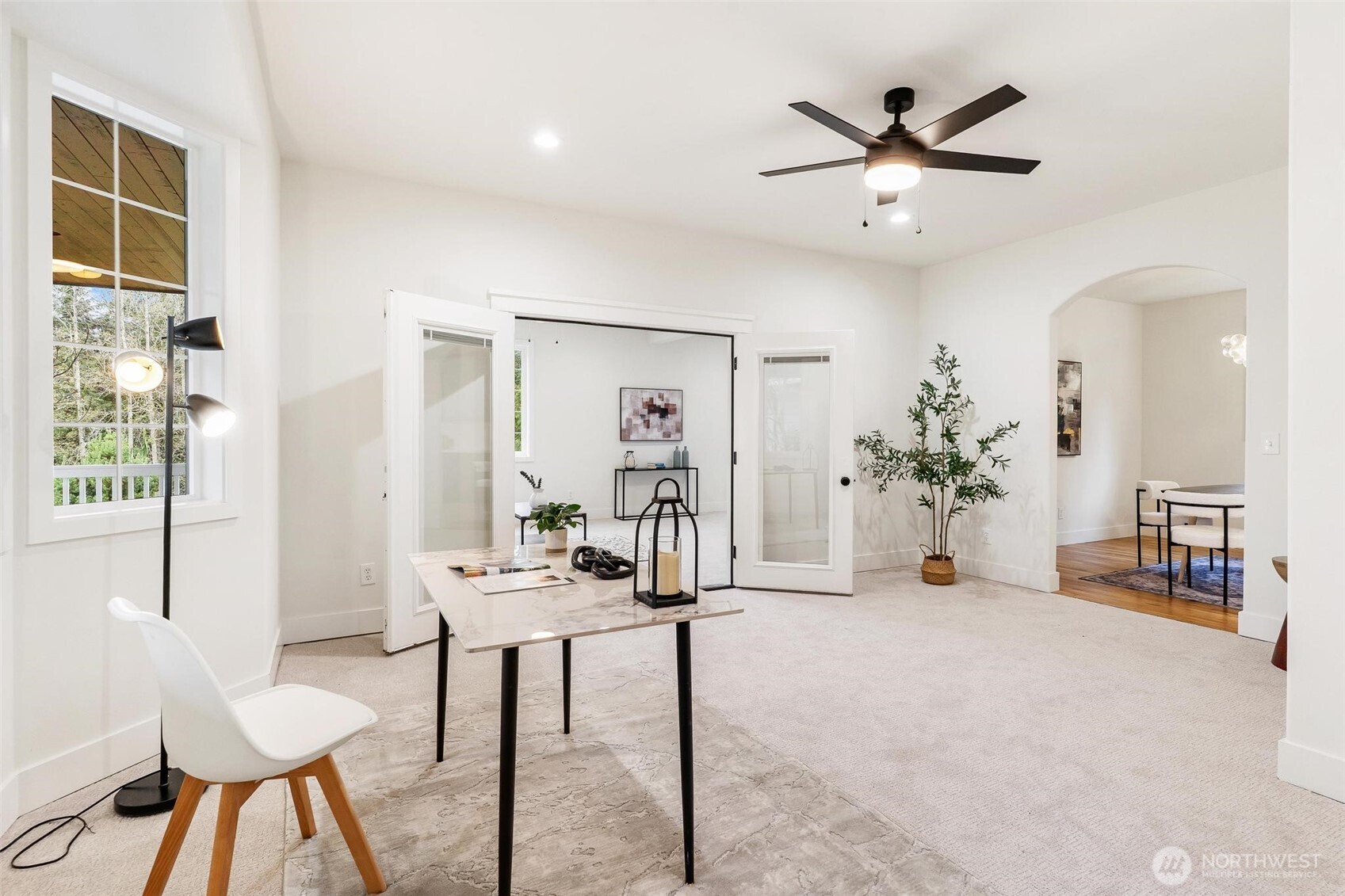 223 South Camano Ridge Road Camano Island, WA 98282 - Photo 19 of 40 a view of a livingroom with furniture and a potted plant