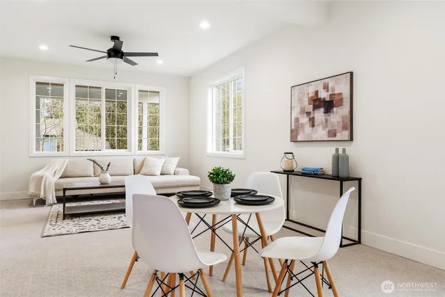 a kitchen with granite countertop a sink and cabinets