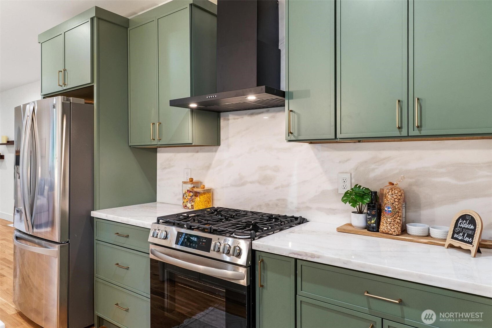 223 South Camano Ridge Road Camano Island, WA 98282 - Photo 25 of 40 a kitchen with a stove and a refrigerator