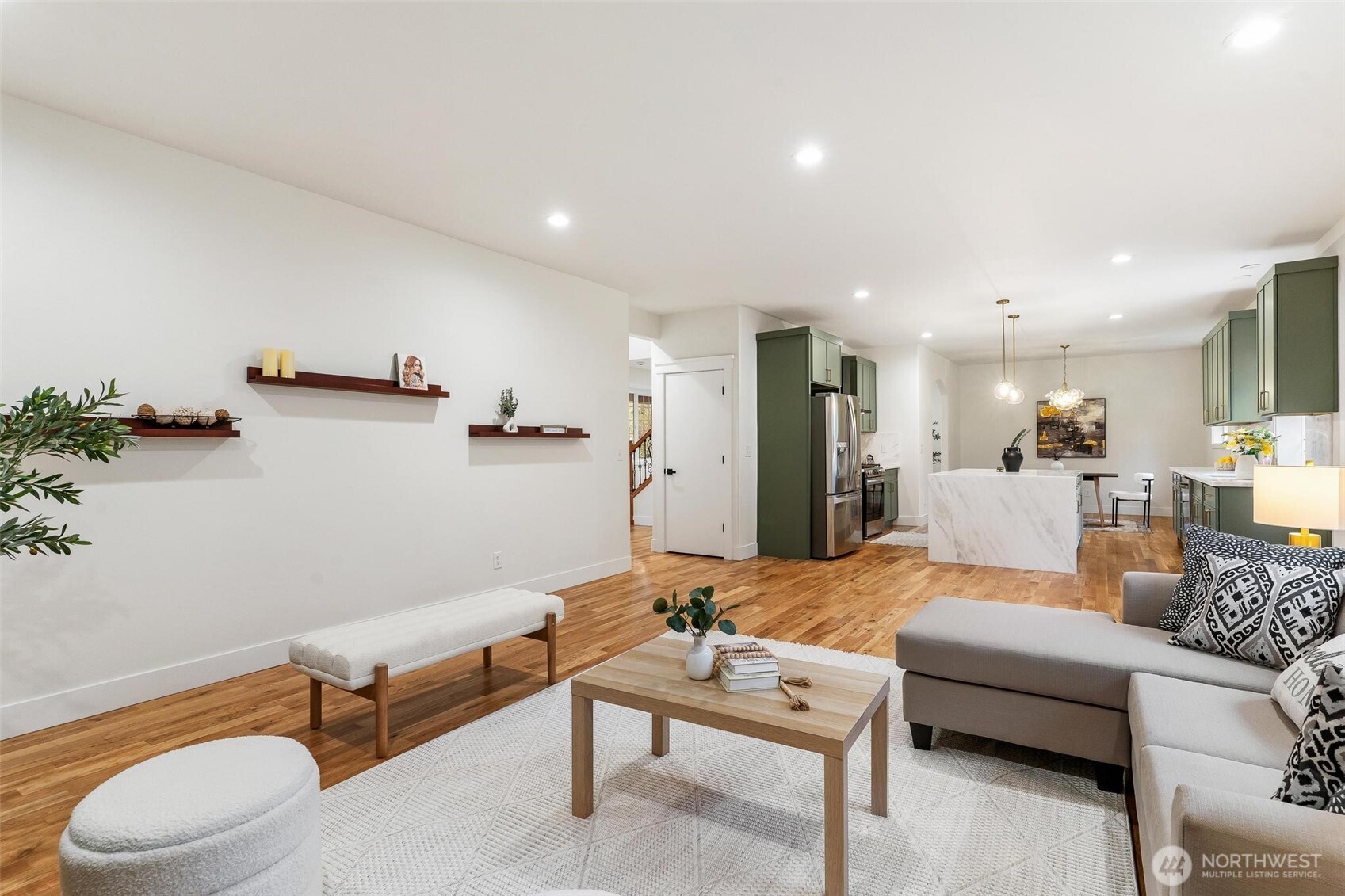 223 South Camano Ridge Road Camano Island, WA 98282 - Photo 30 of 40 a living room with furniture and a wooden floor