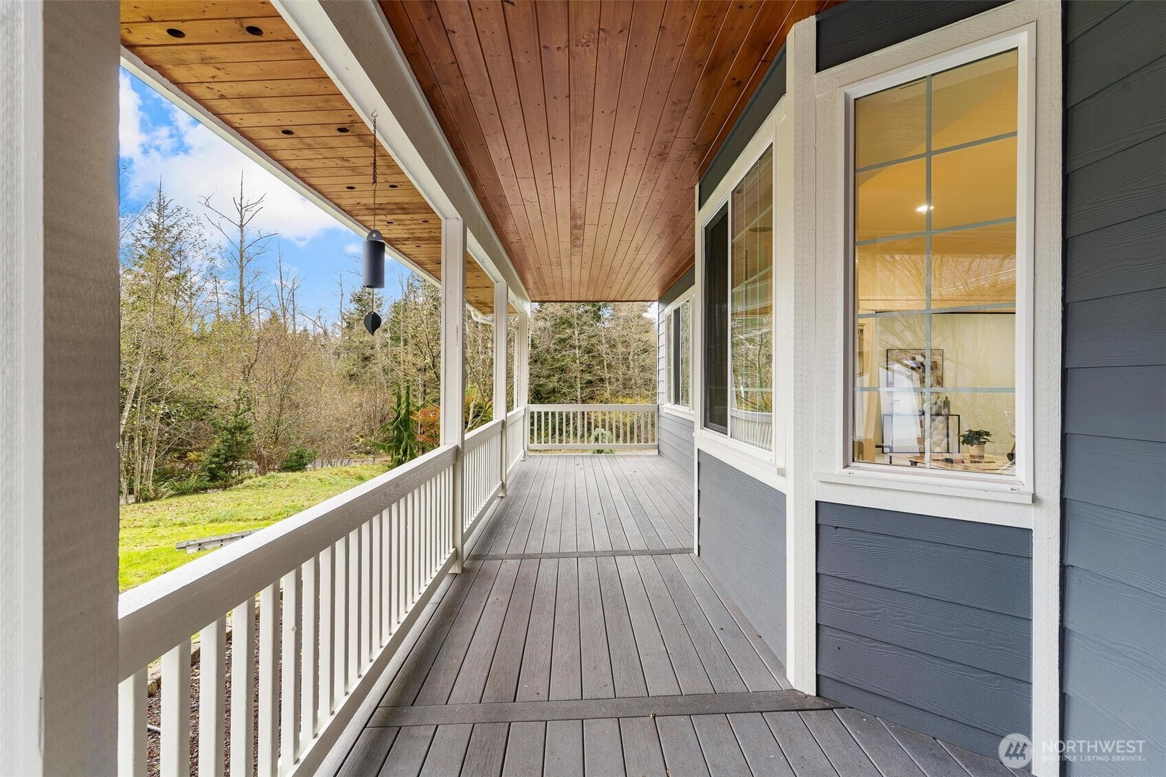223 South Camano Ridge Road Camano Island, WA 98282 - Photo 3 of 40 a view of a balcony with wooden floor