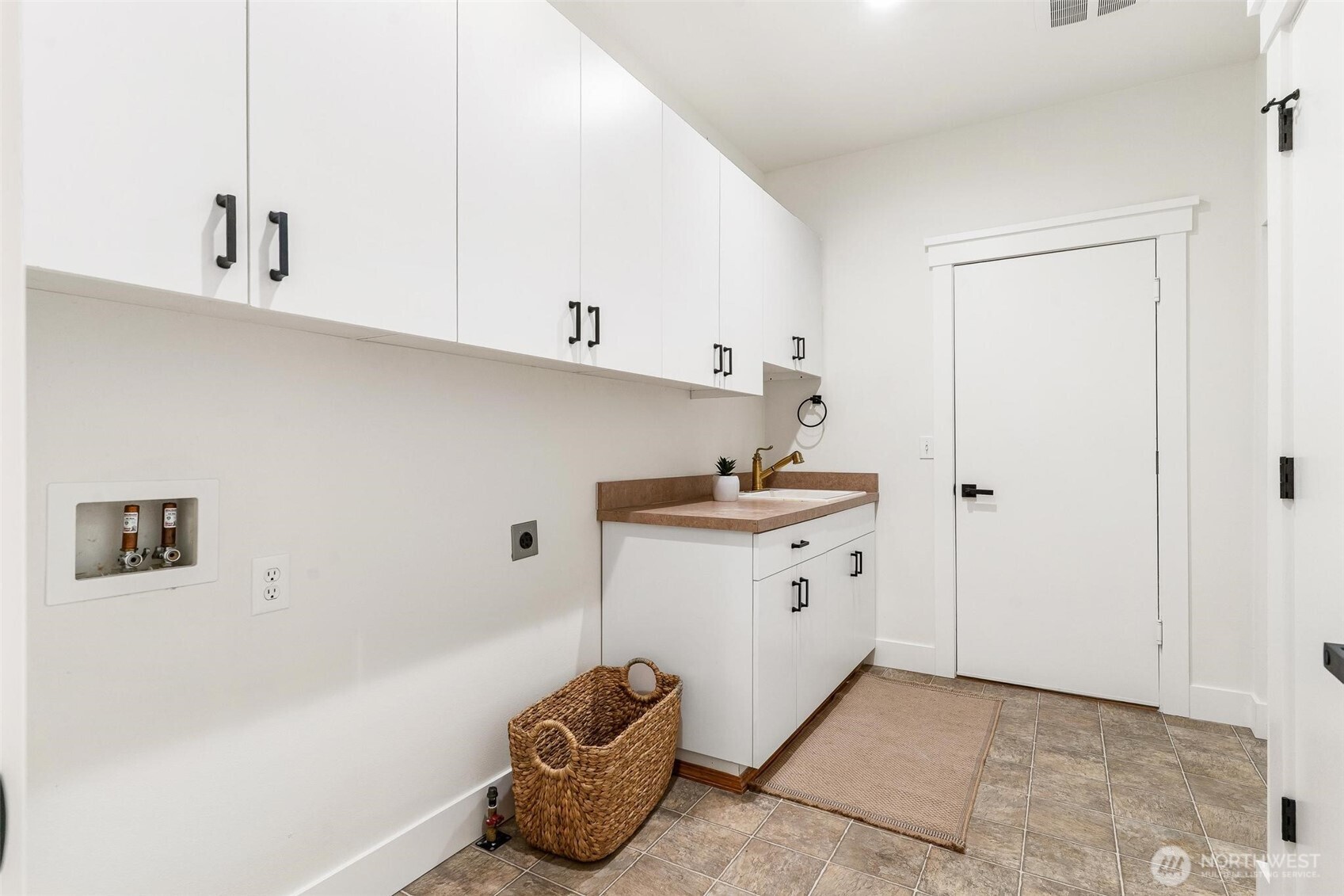 223 South Camano Ridge Road Camano Island, WA 98282 - Photo 33 of 40 a utility room with cabinets washer and dryer
