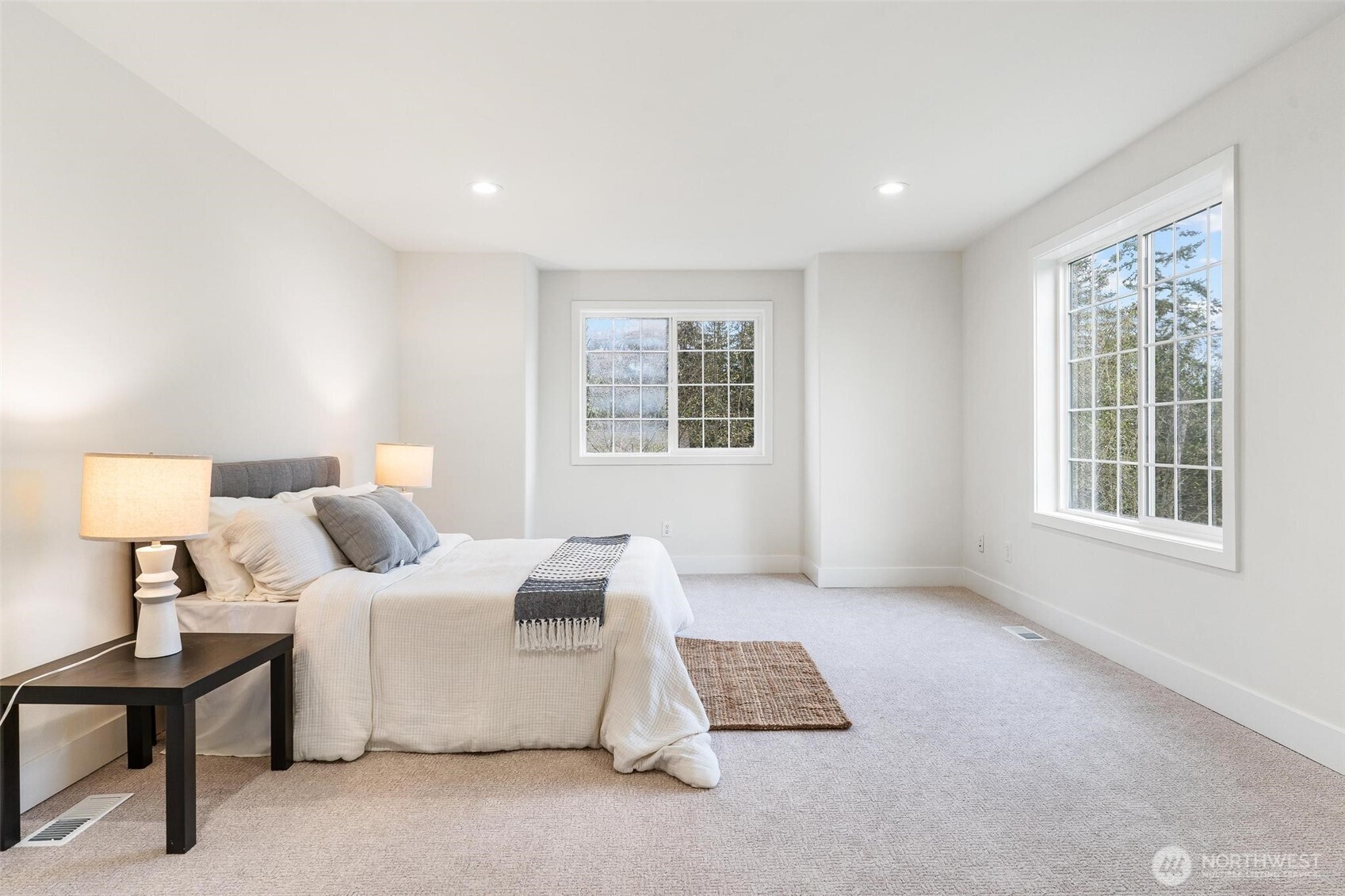 223 South Camano Ridge Road Camano Island, WA 98282 - Photo 8 of 40 a bedroom with a bed and a window