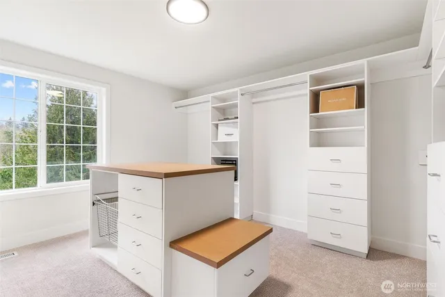 a kitchen with a sink and a refrigerator