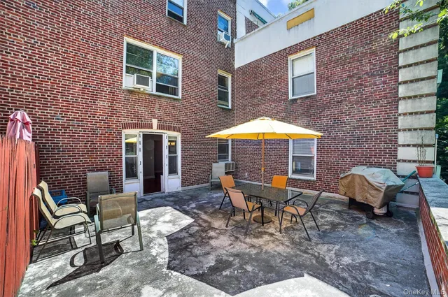 a backyard of a house with seating space