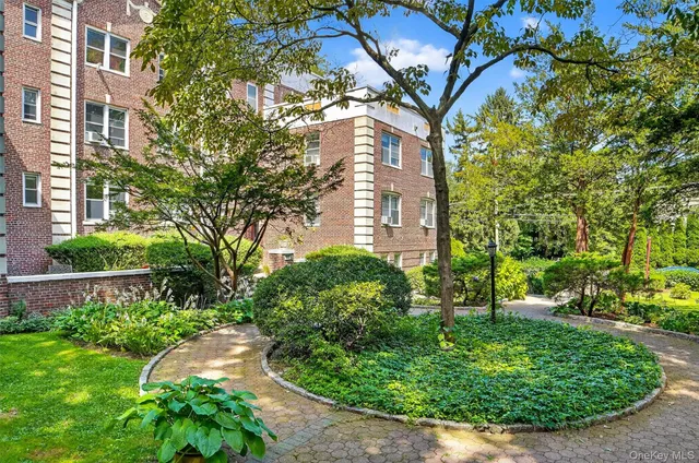 a view of a yard in front of a building