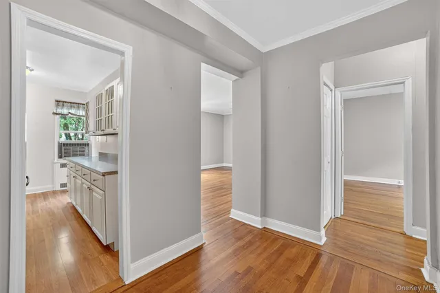 wooden floor in a kitchen and a glass door