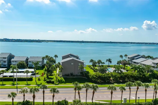 a view of a lake with a garden