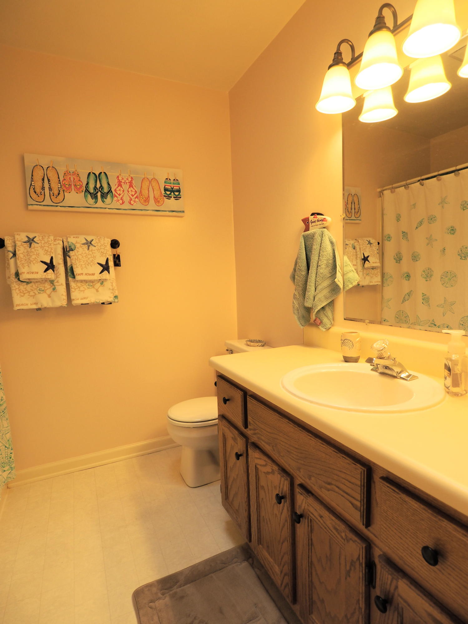 3118 Bandy Road Roanoke, VA 24014 - Photo 11 of 17 a bathroom with a granite countertop sink and a mirror