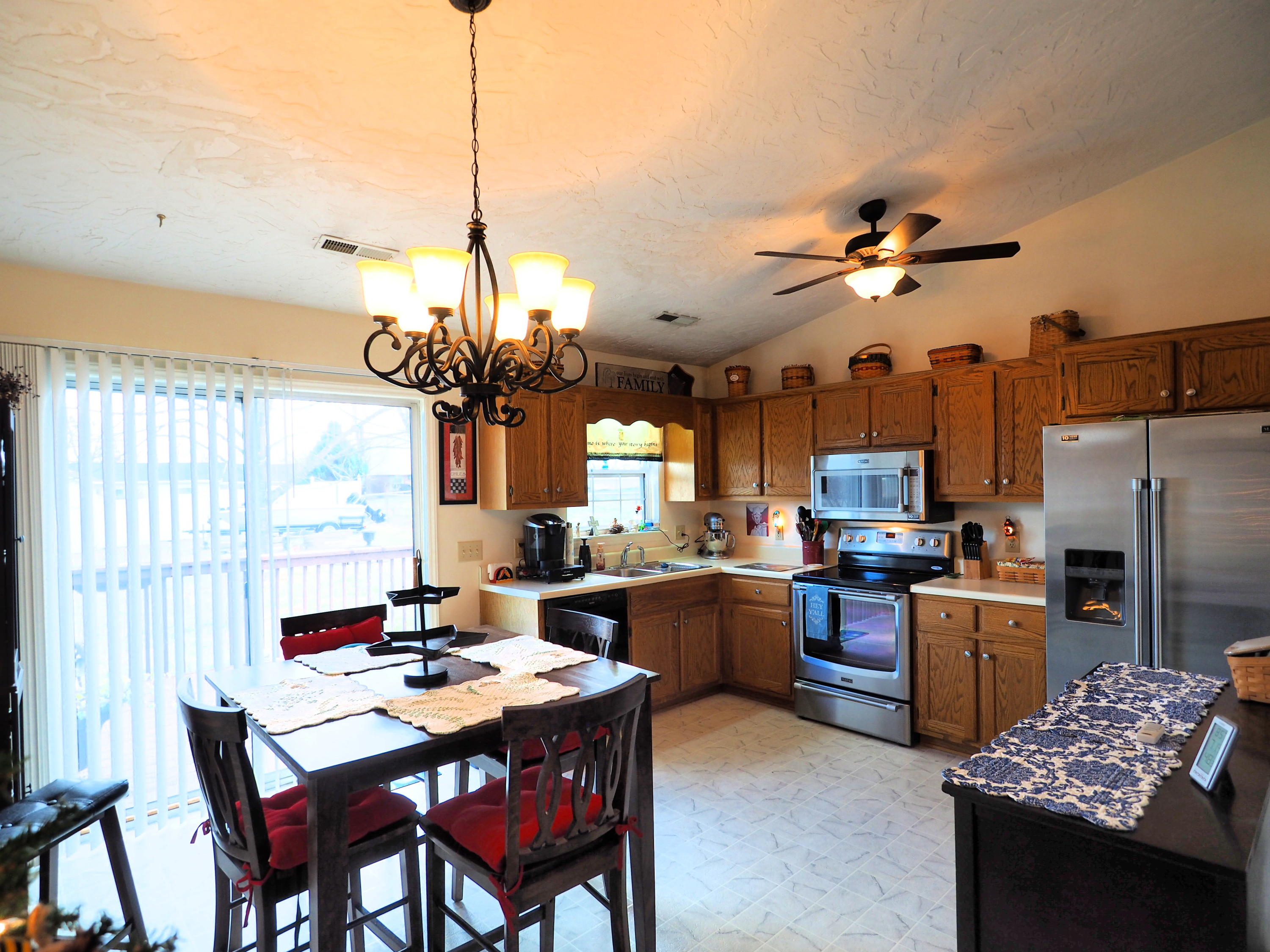 3118 Bandy Road Roanoke, VA 24014 - Photo 3 of 17 a kitchen that has a table and a stove in it