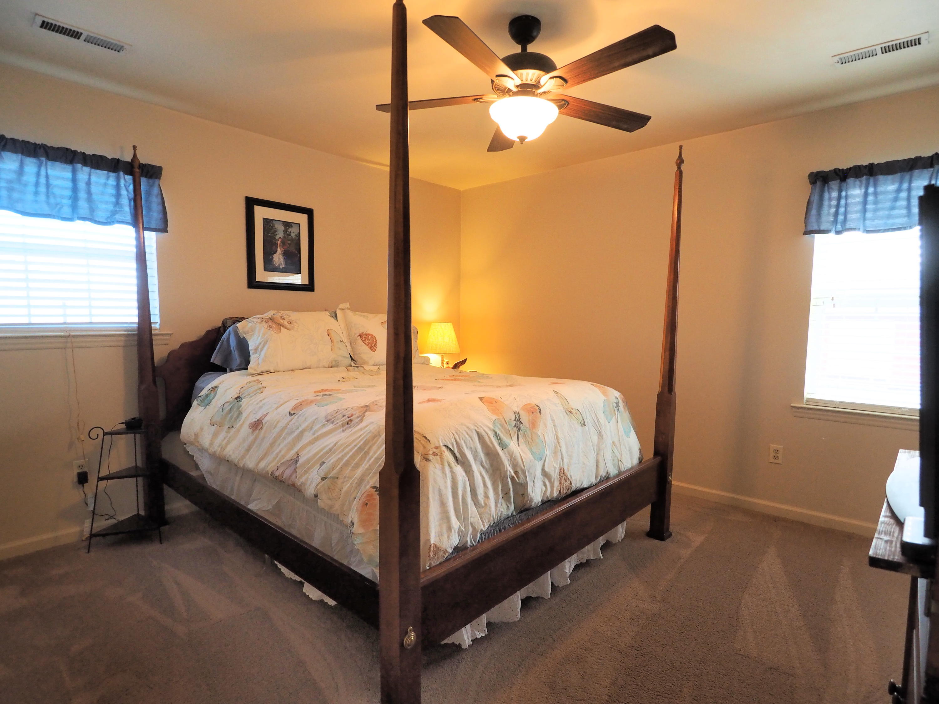 3118 Bandy Road Roanoke, VA 24014 - Photo 6 of 17 a bed sitting in a bedroom next to a window