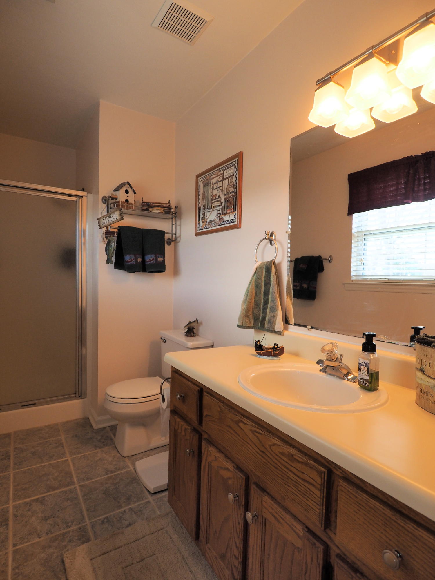 3118 Bandy Road Roanoke, VA 24014 - Photo 8 of 17 a bathroom with a sink toilet and mirror