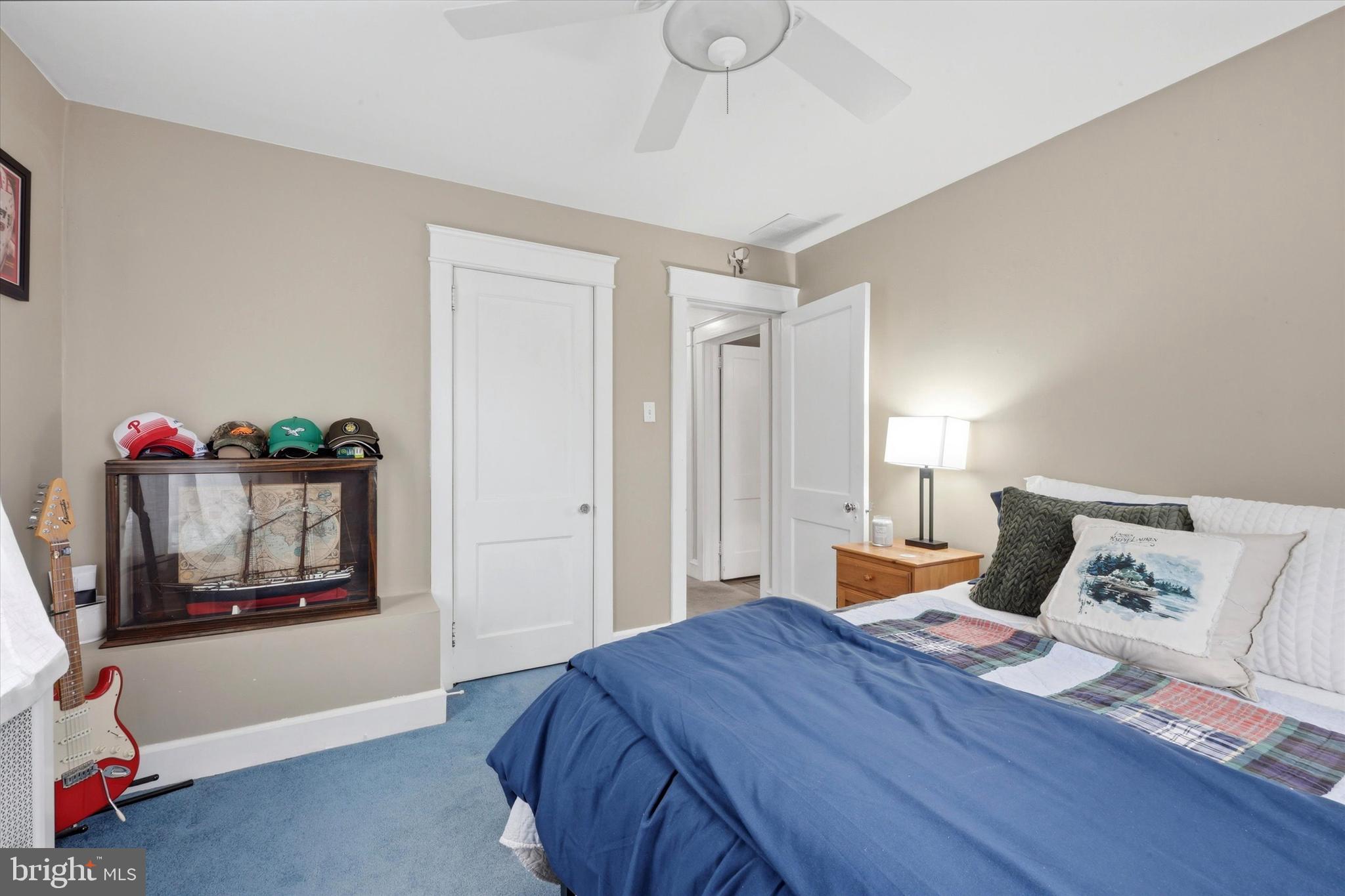 148 Sycamore Road Havertown, PA 19083 - Photo 17 of 29 a bedroom with a bed and wooden floor