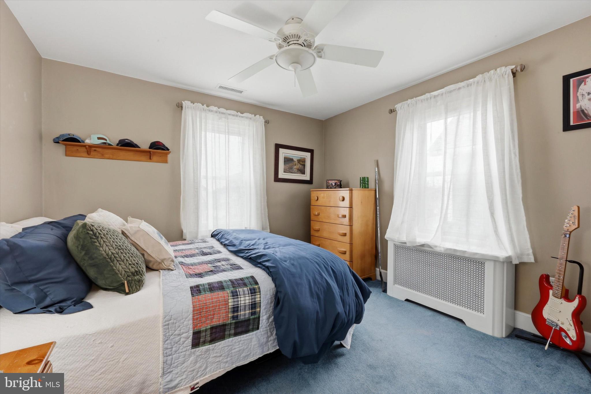 148 Sycamore Road Havertown, PA 19083 - Photo 18 of 29 a bedroom with a bed and a window