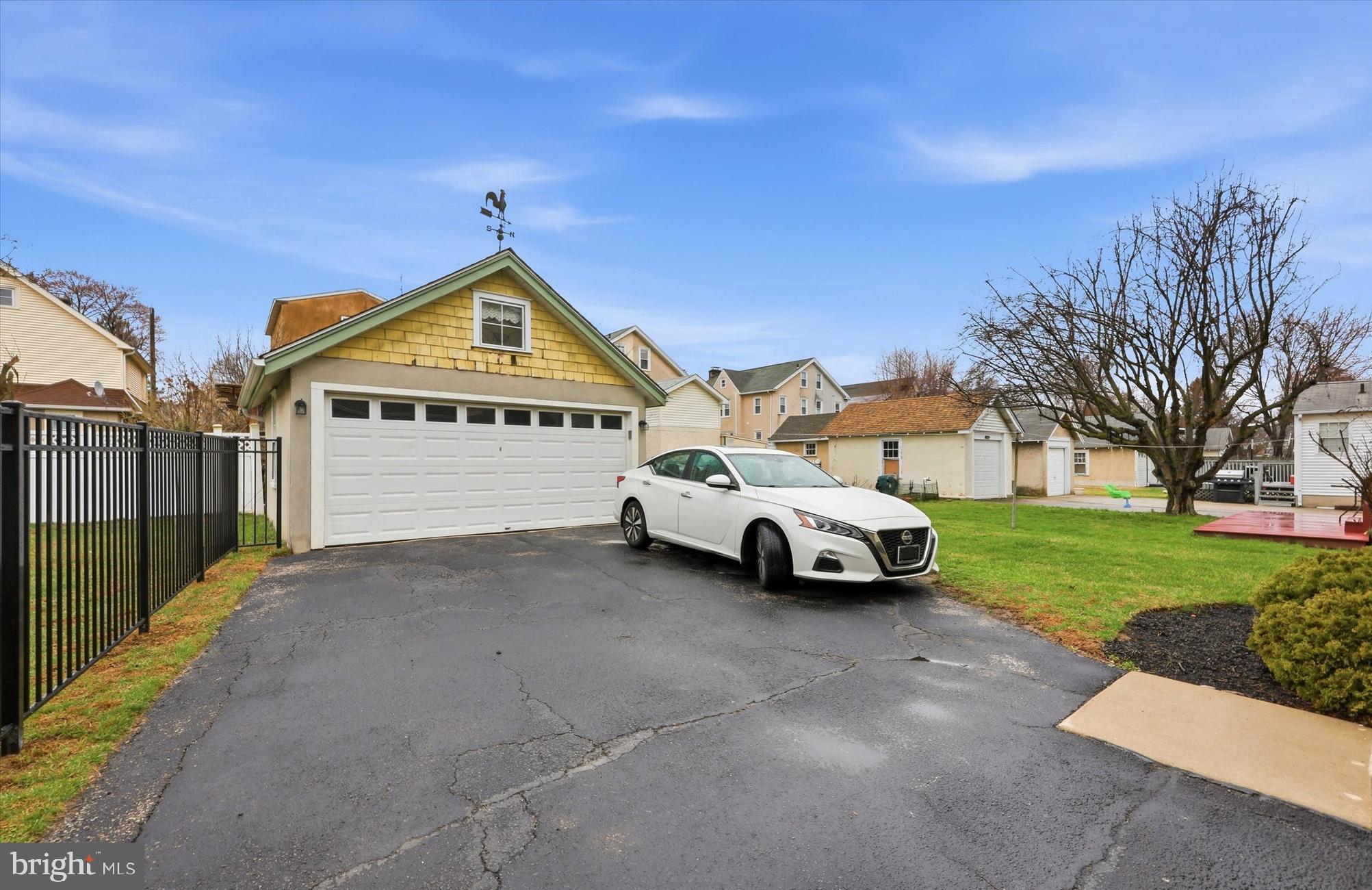 148 Sycamore Road Havertown, PA 19083 - Photo 4 of 29 a view of street with parked cars