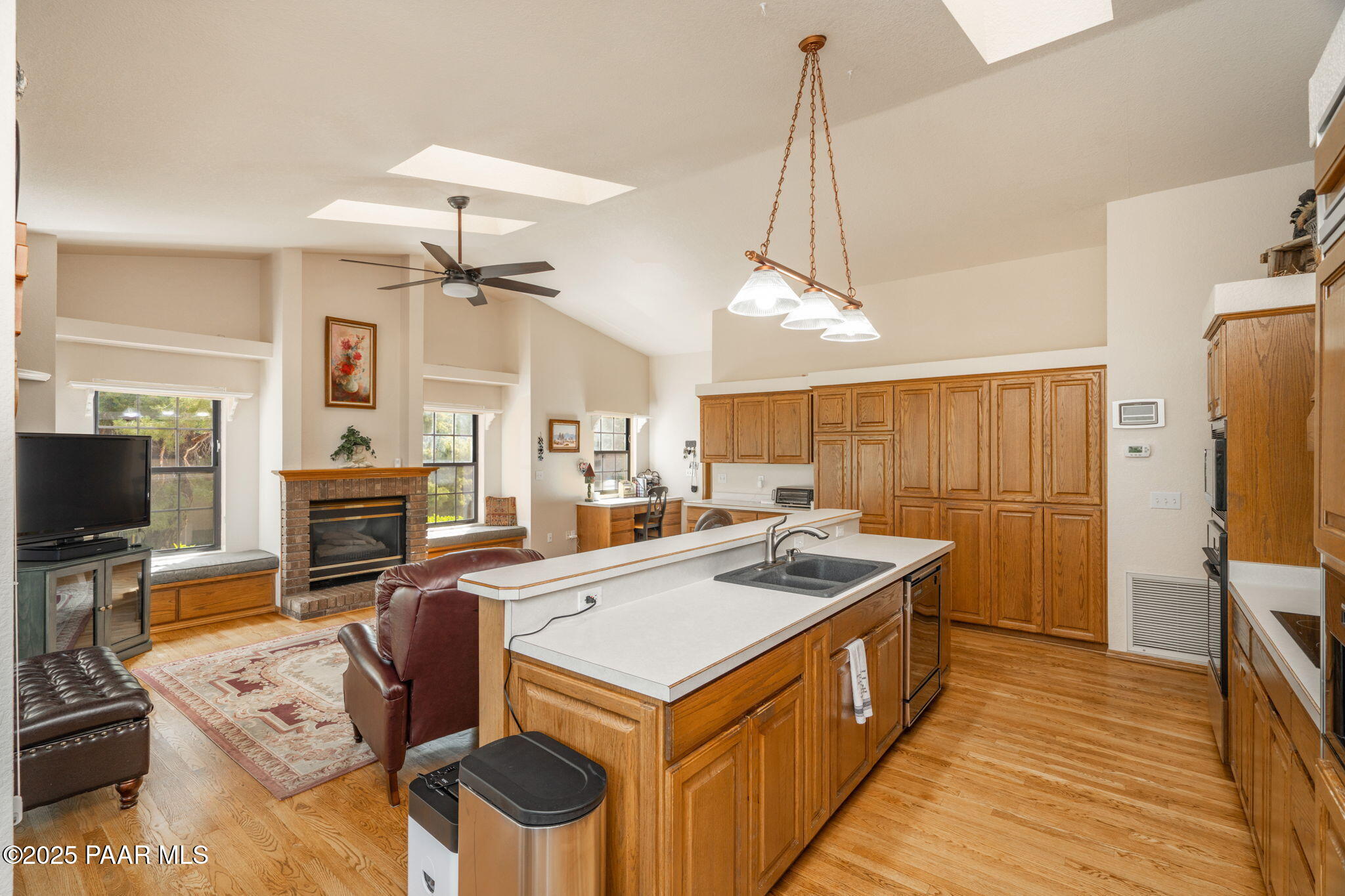 11452 East Turquoise Circle Dewey, AZ 86327 - Photo 12 of 68 a kitchen that has a stove a sink and a refrigerator