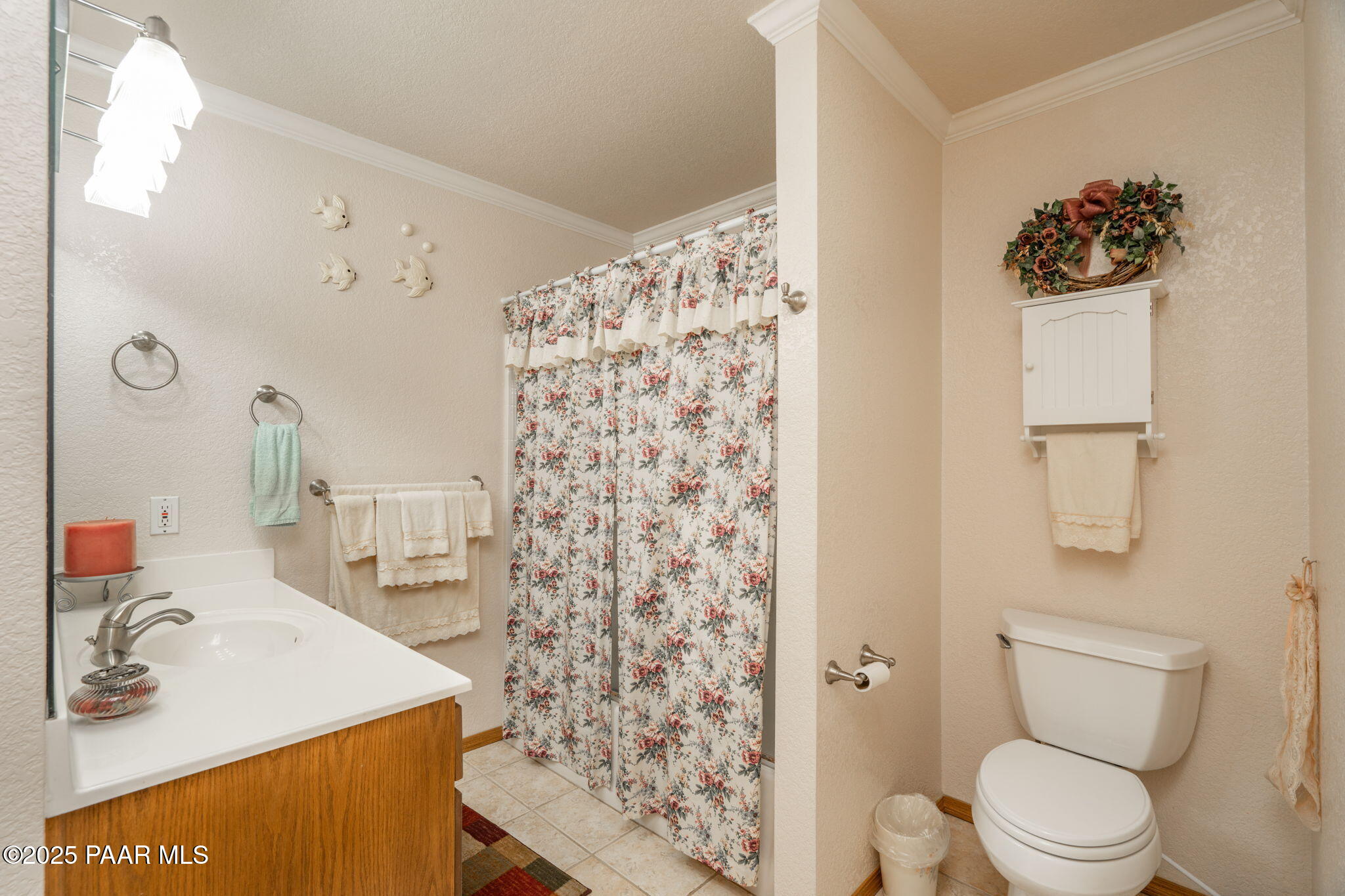 11452 East Turquoise Circle Dewey, AZ 86327 - Photo 22 of 68 a bathroom with a sink toilet and shower