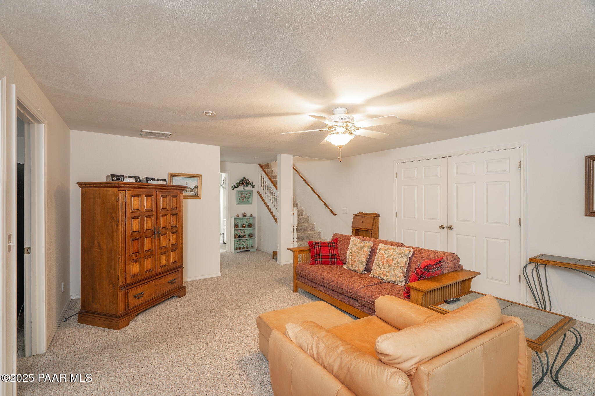11452 East Turquoise Circle Dewey, AZ 86327 - Photo 24 of 68 a living room with furniture and wooden floor