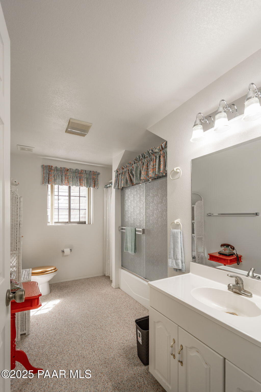 11452 East Turquoise Circle Dewey, AZ 86327 - Photo 29 of 68 a bathroom with a sink and a mirror