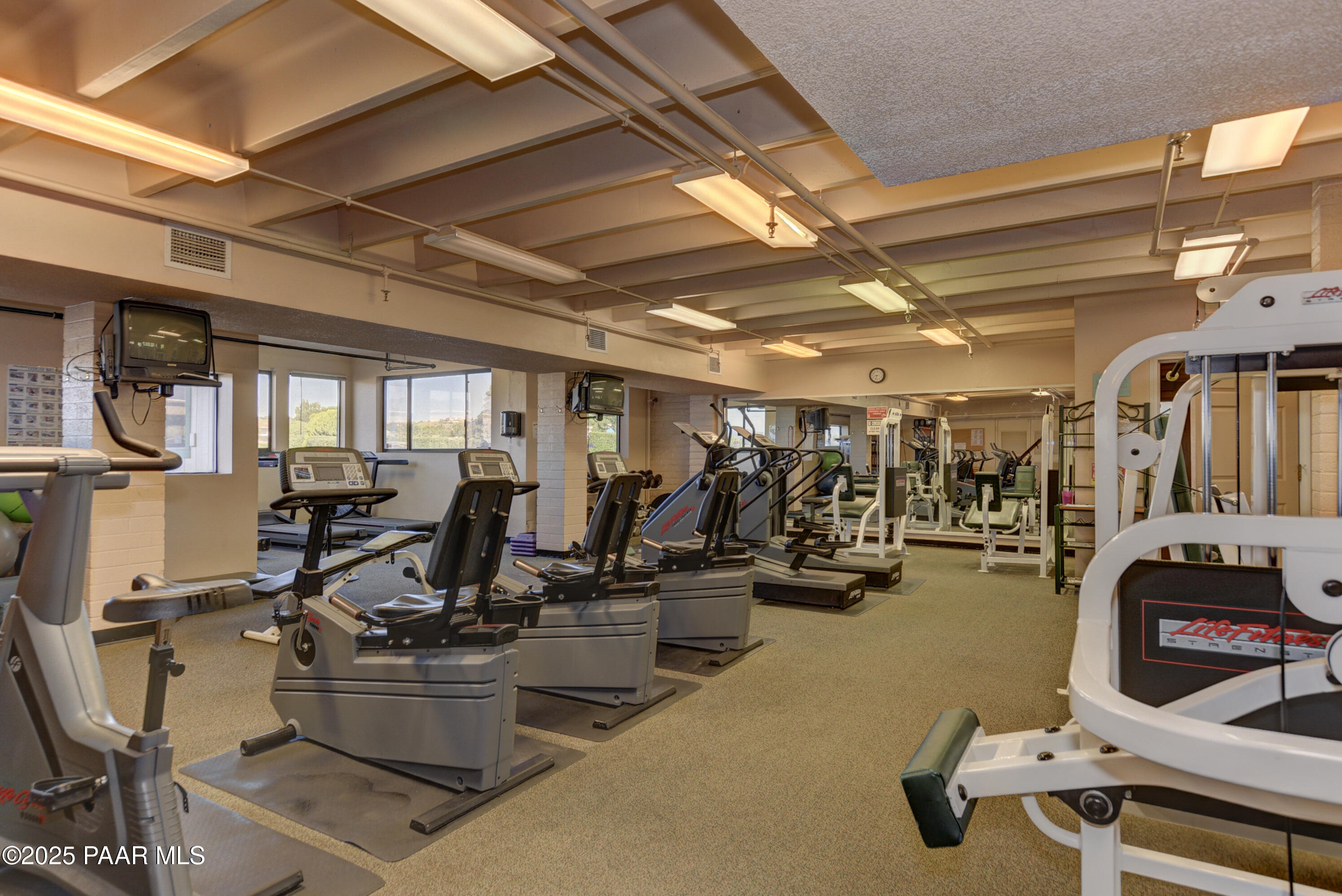 11452 East Turquoise Circle Dewey, AZ 86327 - Photo 57 of 68 a view of a room with gym equipment