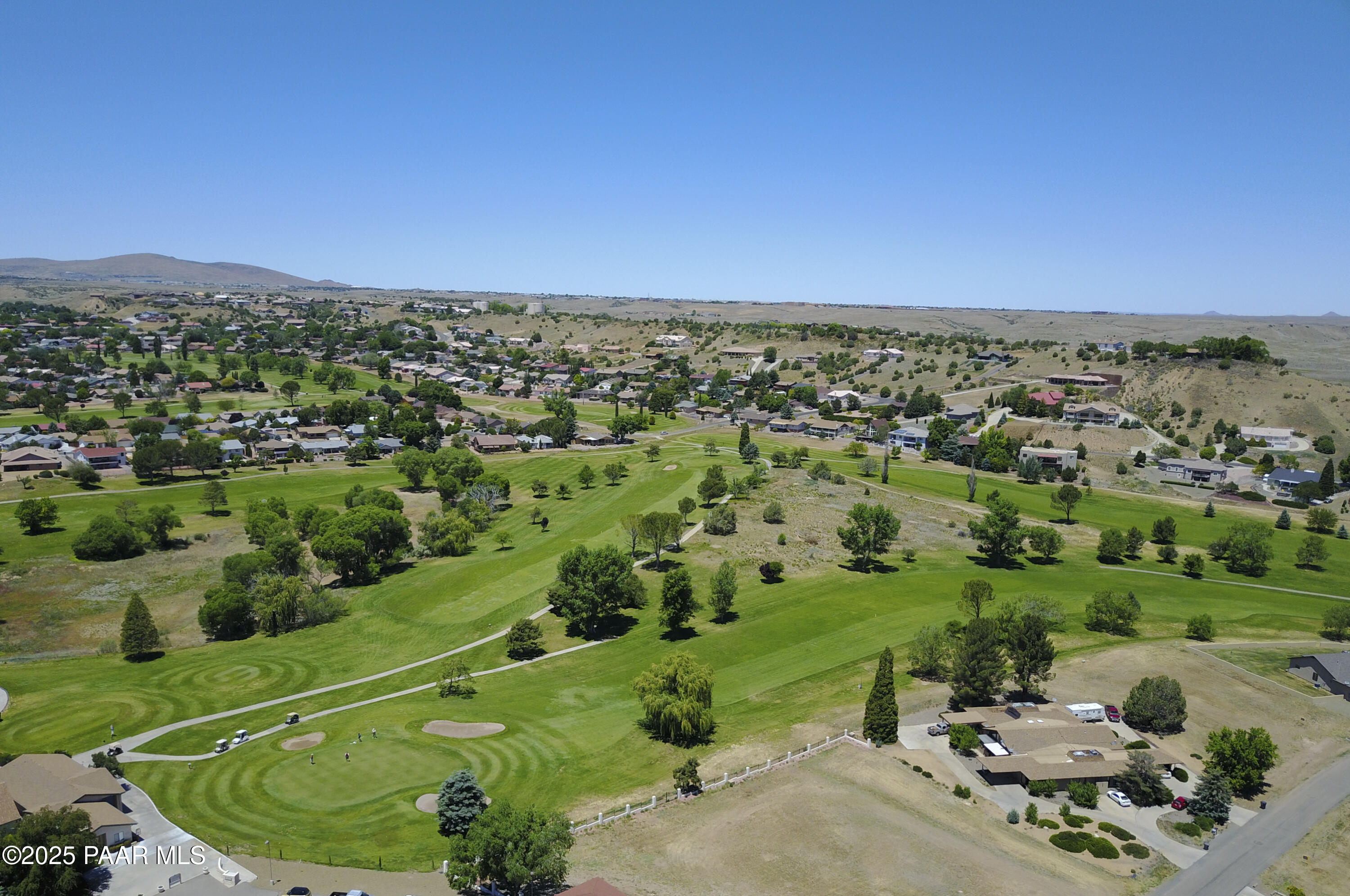 11452 East Turquoise Circle Dewey, AZ 86327 - Photo 65 of 68 an aerial view of a residential houses with outdoor space and trees