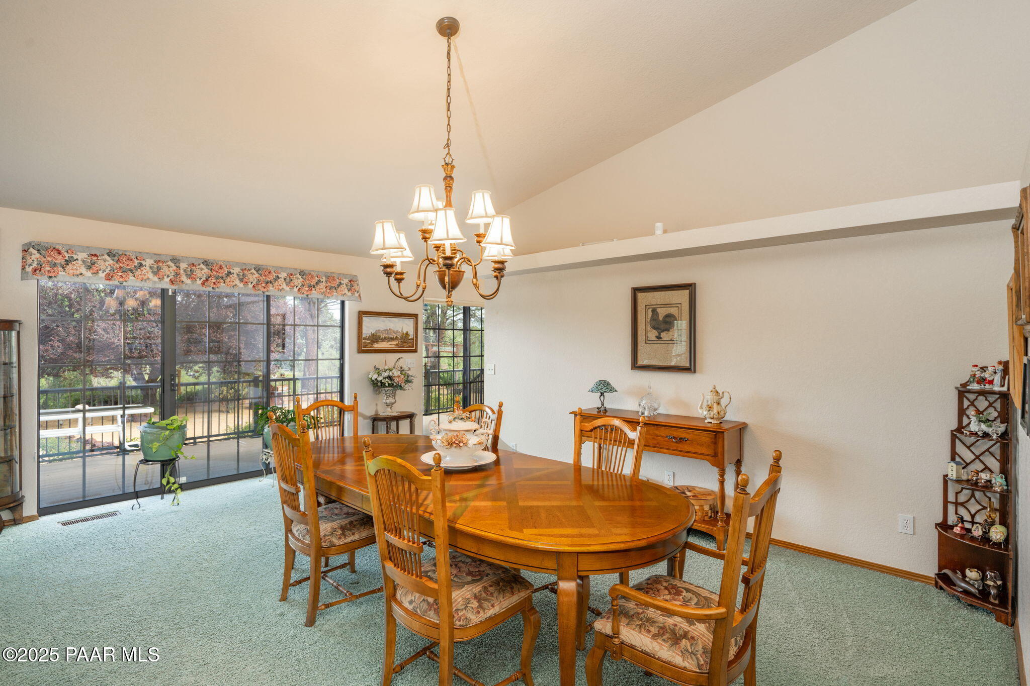 11452 East Turquoise Circle Dewey, AZ 86327 - Photo 7 of 68 a view of a dining room with furniture wooden floor and chandelier