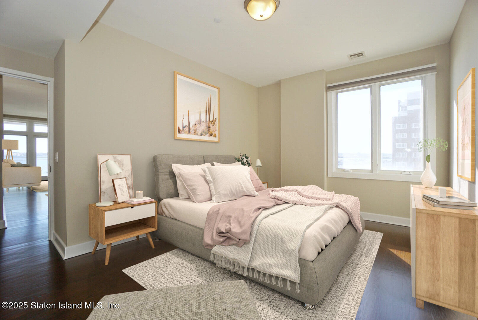 90 Bay Street Landing, Unit 4B Staten Island, NY 10301 - Photo 11 of 42 a bedroom with a bed and a window