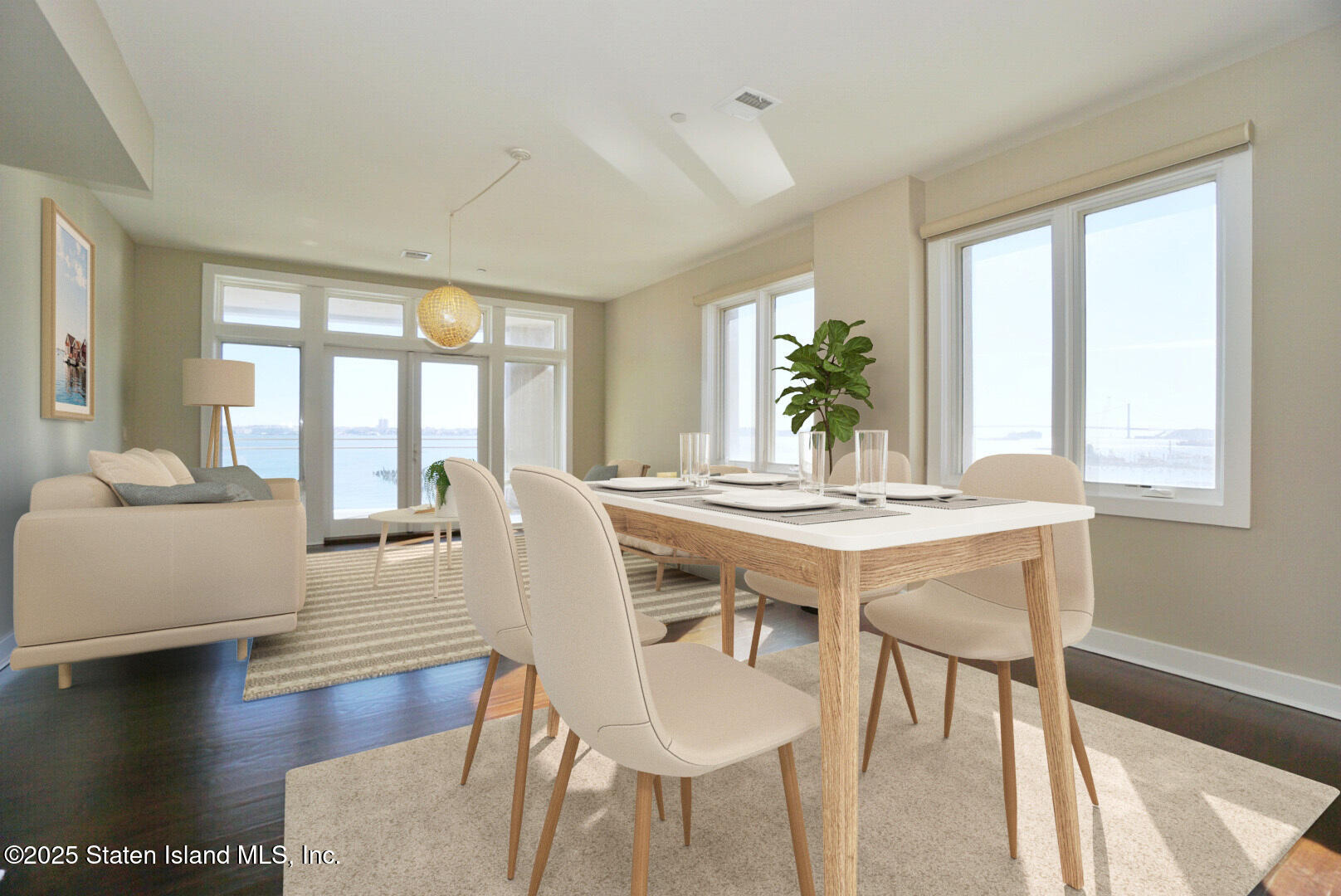 90 Bay Street Landing, Unit 4B Staten Island, NY 10301 - Photo 21 of 42 a dining room with furniture and wooden floor