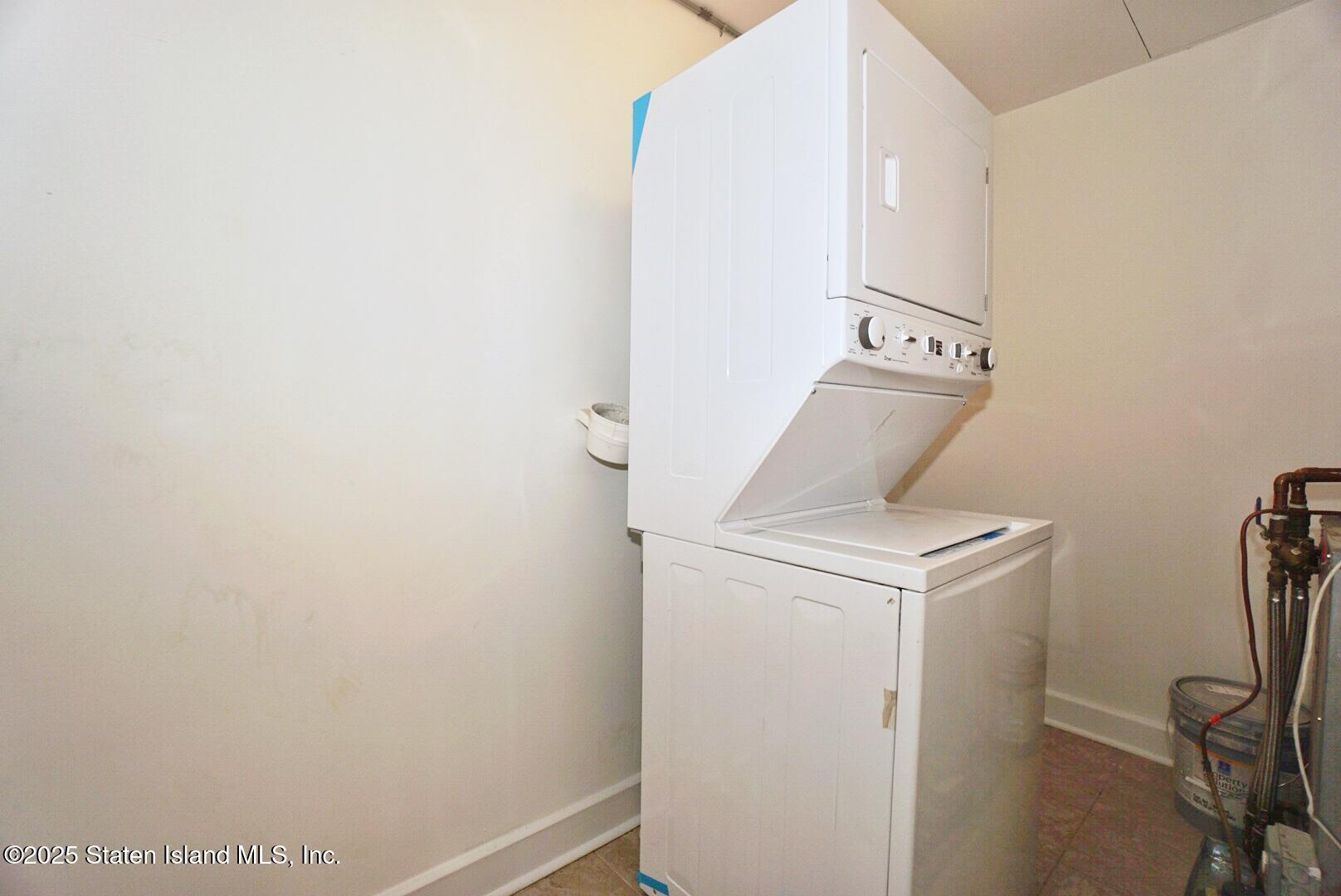 90 Bay Street Landing, Unit 4B Staten Island, NY 10301 - Photo 33 of 42 a utility room with dryer and washer