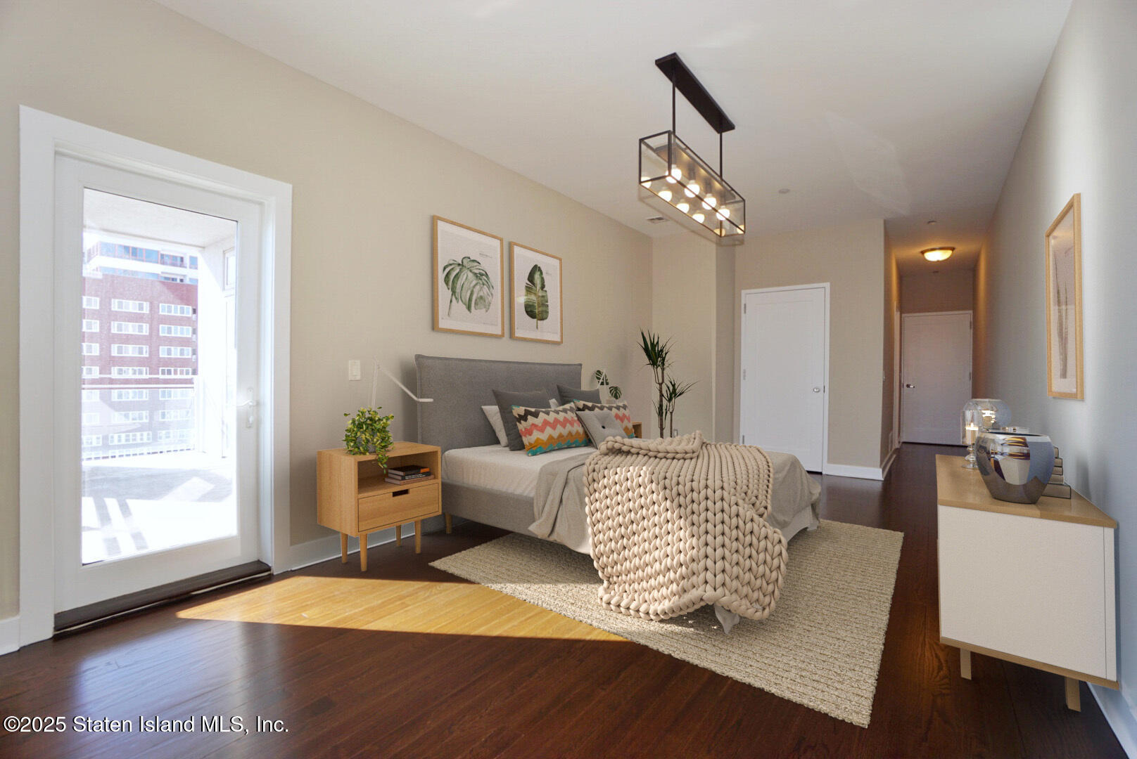 90 Bay Street Landing, Unit 4B Staten Island, NY 10301 - Photo 7 of 42 a living room with furniture window and a chandelier